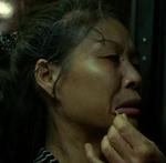 annoying woman on the bus [played by Wong Pui-Wah]