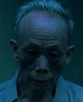 old man outside the elevator [played by Wu Yuk-Bing]