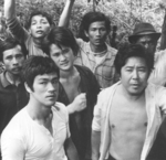 most probably an alternative scene
<br>(This kind of scene is not in any known version of THE BIG BOSS.
As it doesn't fit into the final version, it could have been shot by the movie's first director Wu Chia-Hsiang but later being abandoned due to changes in the screenplay by director Lo Wei.)