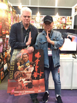 Hong Kong Film Market / 18th – 21st March 2019:<br>
Mang Hoi paying Toby Russell, Hong Kong and Taiwan movie expert and owner of all IFD rights, a visit in his booth. – Many actors, actresses or producers come around to such events.
