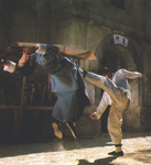 a fighting scene from FIST TO FIST
<br>(with Yuen Wah as a backflip stand-in <br>for the pig-tailed character played by Liang Shao-Hua)