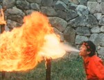 Ma Bin performing Cha Ryeok fire-breathing.