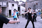 Behind the scenes<p>
Won Jin + Shu Qi