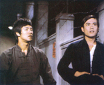 deleted scene <br> (which could be found in a Mandarin print and thus was included in a longer version of THE BIG BOSS, released by Arrow Films in July 2023) – This only studio scene was shot on 4th September 1971 two days after finishing filming in Thailand. Finally, the so-called (to some sources) 