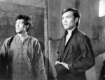 deleted scene <br> (which could be found in a Mandarin print and thus was included in a longer version of THE BIG BOSS, released by Arrow Films in July 2023) – This only studio scene was shot on 4th September 1971 two days after finishing filming in Thailand. Finally, the so-called (to some sources) 