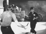 Bruce Lee going to defeat attacker Piet Schweer