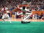 The Zhejiang team performs the bare hands vs spear and sabre routine in the 1982 Hangzhou National Wushu competition.