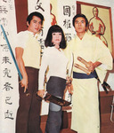From left to right: Nard Poowanai, Pawana Chanajit and
Kurata Yasuaki on the set of THE KING OF BOXERS